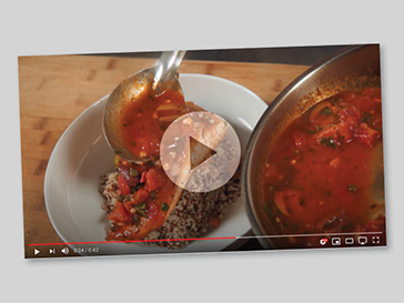 Screenshot of food video with play button